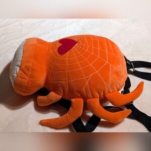 Skelanimals Orange Timmy Glow-In-The-Dark Plush Backpack.